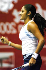Sunitha Rao of the USA exults after defeating compatriot Neha Uberoi in the first round of the WTA Sunfeast Open in Kolkata on Tuesday