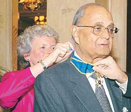 The Swedish Ambassador to India, Ms Inga Eriksson, ties the �Royal Order of the Polar Star� on behalf of the King of Sweden Carl XVI Gustaf, on Mr H.S. Singhania, Chairman, JK Group, in New Delhi on Wednesday.