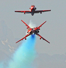 Indian Air Force Suryakiran team performs during an air show in Rangreth, on the outskirts of Srinagar, on Wednesday. The Suryakiran performed many aerobatic manoeuvres on the first day of a two-day air show organised by the Indian Air Force to motivate the Kashmiri youth to join the IAF.
