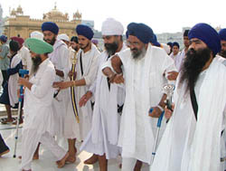 Baba Sarbjot Singh Bedi, President, Sant Samaj, Baba Harnam Singh Dhumma, chief of Damdami Taksal, at the Golden Temple after Chetna March in Amritsar on Wednesday. 
