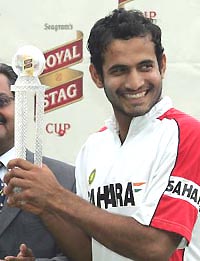 Irfan Pathan holds the man of the series trophy after India won the second Test against Zimbabwe at the Harare Sports Club on Thursday