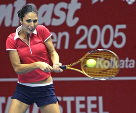 Anastasia Myskina of Russia in action against Croatia's Karolina Sprem in the Sunfeast Open final in Kolkata on Sunday