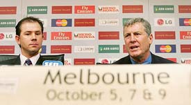 ICC World XI coach John Wright speaks as Australian captain Ricky Ponting looks on during a press conference at Docklands Stadium, where Australia will take on the ICC World XI in three ODIs in Melbourne on Wednesday