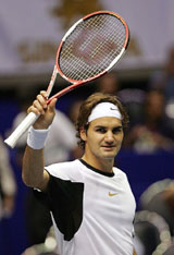 Roger Federer of Switzerland celebrates his win against Denis Gremelmayr of Germany in the second round of the Thailand Open in Bangkok on Thursday