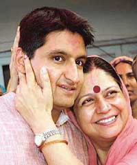 Deepinder Hooda gets a hug from his mother after winning the Rohtak Lok Sabha seat on Saturday