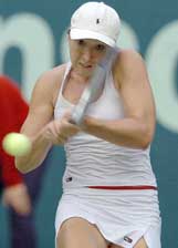 Jelena Jankovic of Serbia-Montenegro returns the ball during her match against Tatiana Golovin of France at the Hansol Korea Open in Seoul on Saturday. Jankovic won 6-4, 5-7, 6-4. 