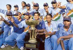 Indian under-21 women cricketers celebrate at the Gaddafi Stadium 