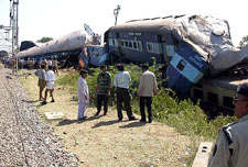 The wreckage of a passenger train which derailed near Datiya, 280 km north of Bhopal, on Monday