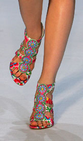 A model presents a creation by Singapore-born designer Andrew GN during his Spring/Summer, 2006, ready-to-wear fashion show in Paris on Wednesday.