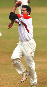 Sachin Tendulkar tries his hand at bowling at the Wankhede Stadium in Mumbai on Wednesday