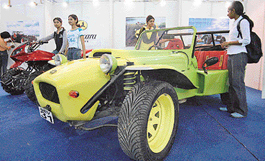 Visitors admire a modified sports car, Chinkara 1.8S, at an annual exhibition of vehicles in Bangalore on Friday evening. The car is priced at Rs 7.40 lakh.