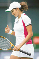 Sania Mirza reacts after missing a shot against Tatiana Golovin of France during the semifinal of the AIG Japan Open in Tokyo on Saturday. Golovin won 6-2, 6-4 to enter the final.
