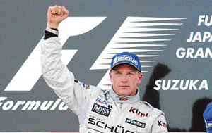McLaren�s Formula One driver Kimi Raikkonen of Finland  celebrates his win in the Japanese Grand Prix in Suzuka on Sunday. 