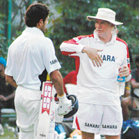 Greg Chappell in conversation with Yuvraj Singh at the PCA Stadium in Mohali on Sunday. 