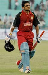 Parthiv Patel of India B walks back to the pavilion after being dismissed for 53 during a league match of the NKP Salve Challenger Trophy