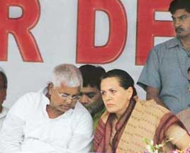 RJD chief Lalu Prasad Yadav and UPA Chairperson Sonia Gandhi during an election rally at Gandhi Maidan in Patna on Saturday.