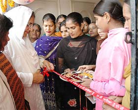 Punjab Deputy Chief Minister Rajinder Kaur Bhattal inaugurates a food processing, tailoring and stitching centre at Lehragaga, Sangrur