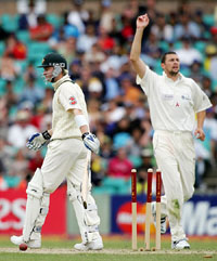 Australia�s Michael Clarke  walks back after being bowled by Steve Harmison of World XI during the third day of the Super Test in Sydney