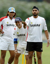 Sachin Tendulkar with Harbhajan Singh (right) and Mahendra Singh Dhoni during the training camp at the National Cricket Academy in Bangalore on Wednesday