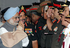 Prime Minister Manmohan Singh greets officers of the armed forces