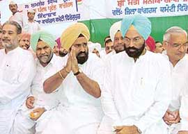 PPCC president Shamsher Singh Dullo greets party workers at the Congress Bhavan in Ferozepore on Thursday.