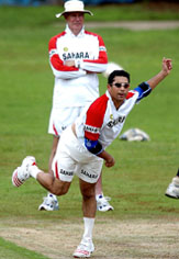 Sachin Tendulkar bowls during a practice session at the National Cricket Academy in Bangalore on Thursday.