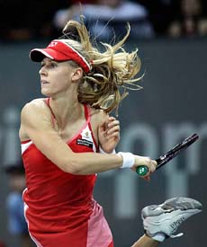 Elena Dementieva of Russia in action against Nathalie Dechy of France during their second round match at the Zurich Open in Zurich on Wednesday. Dementieva won 5-7, 6-2, 6-4.