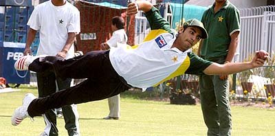 Pakistani cricketer Sulman Butt takes a catch during a training session ahead of the home-series against England, in Lahore on Friday