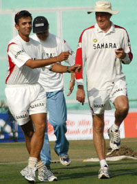Rahul Dravid and Greg Chappell in a playful mood during a practice session on the eve of the second one-dayer against Sri Lanka in Mohali