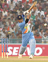 Sachin Tendulkar plays a shot during the second one-dayer against Sri Lanka at the PCA Stadium in Mohali on Friday