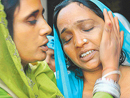 The mourning wife of Nirmal Singh, who was shot dead at Hangola village, near Barwala, on Monday.