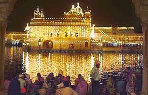 A tastefully decorated Golden Temple shines in all its glory on the eve of Divali in Amritsar on Monday.