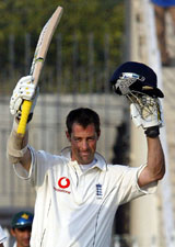 England�s Marcus Trescothick celebrates after completing his century on the opening day of a three-day match against Pakistan Cricket Board Patron�s XI at the Pindi