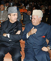 New Chief Minister of Jammu and Kashmir Ghulam Nabi Azad with a former Chief Minister, Dr Farooq Abdullah, during the oath-taking ceremony.