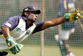 Sri Lankan wicketkeeper Kumar Sangakkara in action during a practice session in Pune on Wednesday