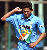 Ajit Agarkar exults after taking five wickets during the fourth one-day international against Sri Lanka in Pune on Thursday