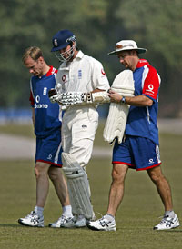 England cricket captain Michael Vaughan leaves the field after sufffering a knee injury on the second day of a cricket tour match in Lahore