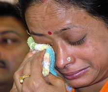Sunita, who lost her daughter Neha in the Delhi serial bomb blasts, breaks down at a Press conference organised by the All-India Anti-Terrorist Front in Delhi on Tuesday.