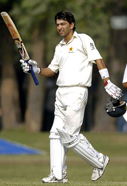 Hasan Raza of Pakistan A celebrates after scoring a half century during the final day of a three-day warm-up match against England in Lahore on Tuesday