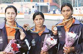Hansda Jhanu, gold, Besra Sakro, silver, and Bansaralin Dhar, bronze, pose with their medals in women�s compound individual division during the 14th Asian Archery Championship