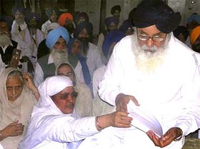 The SAD President, Mr Parkash Singh Badal, with the SGPC chief, Bibi Jagir Kaur, at Amb Sahib Gurdwara in Mohali
