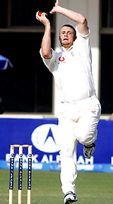 Andrew Flintoff of England bowls during the fourth day of the first Test match in Multan on Tuesday