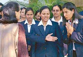Congress President Sonia Gandhi interacts with members of the Indian women�s cricket team in New Delhi on Sunday. The India-England Test begins in the Capital on Monday.