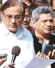 Finance Minister P. Chidambaram with CPM Politburo member Sita Ram Yechuri at a Press conference in New Delhi on Monday.