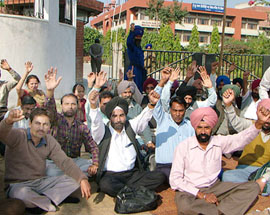 Parents of 36 students of the SGPC-run Sri Guru Ram Das College of Medical Sciences and Research lodge their protest in front of the college for non-issuance of roll numbers to their wards, at Vallah in Amritsar on Monday.