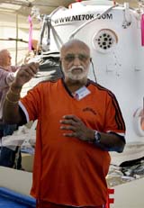 Indian industrialist and aviator Dr Vijaypat Singhania speaks to reporters about his hot air balloon journey �Mission Impossible� at a press conference at the Mahalaxmi Race Course in Mumbai