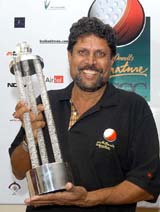 Kapil Dev holds the trophy after winning the individual event of the Signature McDowell�s World Cup of Golfing Cricketers at the Karnataka Golf Association ground in Bangalore on Sunday