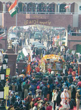 History was scripted when the special bedecked vehicle carrying the Guru Granth Sahib in a golden palanquin was given the guard of honour in India and Pakistan on Tuesday