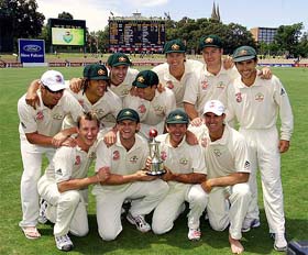 Australian team members with the Frank Worrell Trophy after winning the third Test against the West Indies in Adelaide