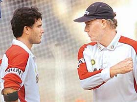 India�s coach Greg Chappell talks to former captain Sourav Ganguly during a practice session at the M.A.Chidambaram Stadium in Chennai